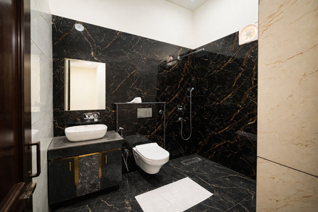 Central pathway through Corbett Vantara resort cottages