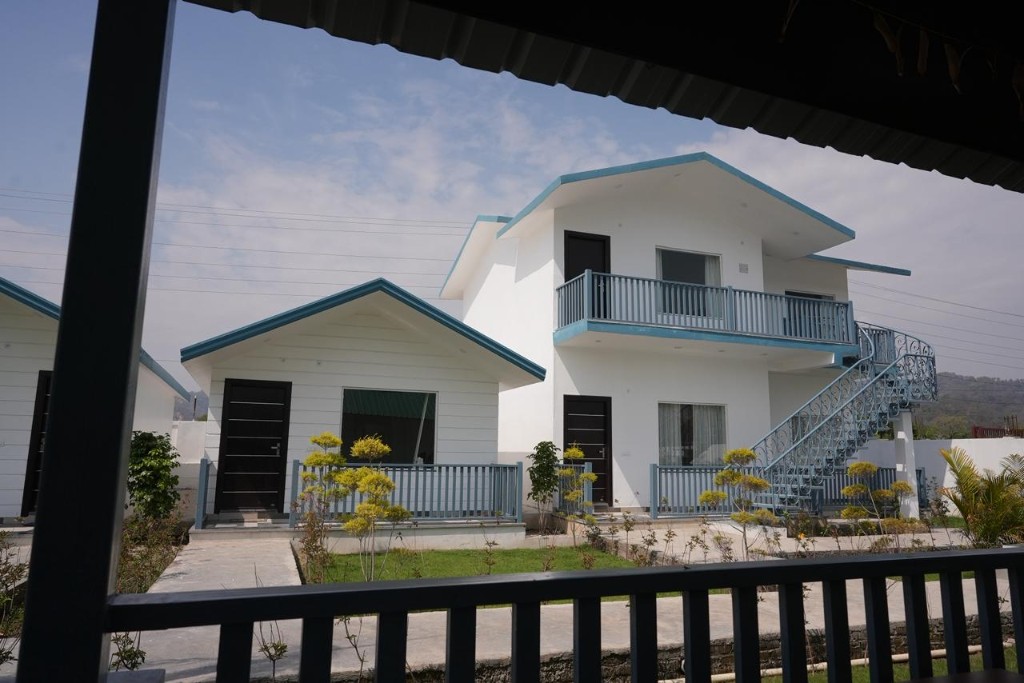 Luxury bathroom with black marble tiles and walk-in shower