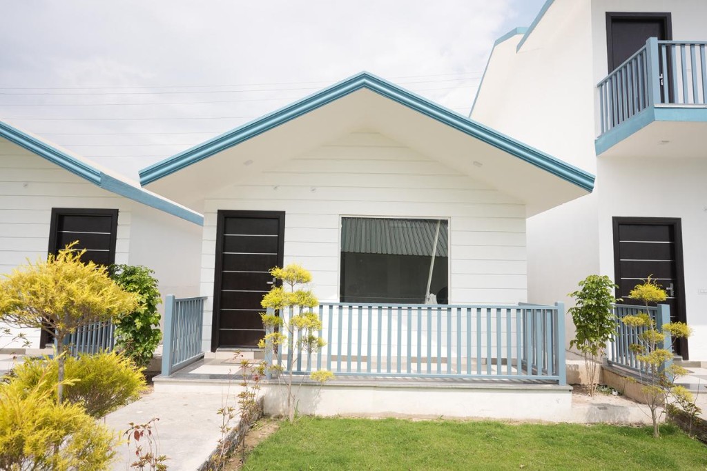 Exterior of Corbett Vantara villas and landscaped grounds
